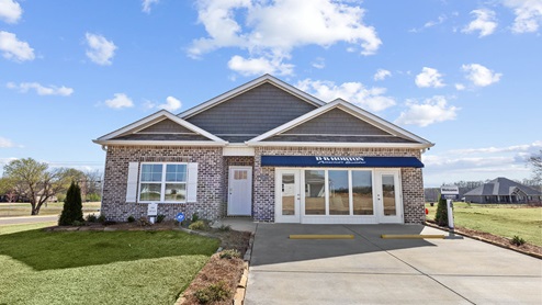 Single story home with brick and two car garage