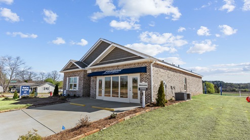 Single story home with brick and two car garage