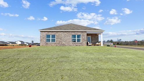 Back yard access with view of the back of the house
