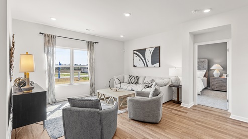 Dining room area with LVP flooring and windows