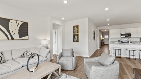 Kitchen island with view of dining / living room area