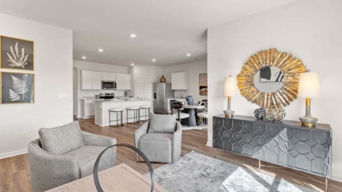 Kitchen island with view of dining / living room area