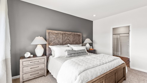 Primary bedroom with carpet