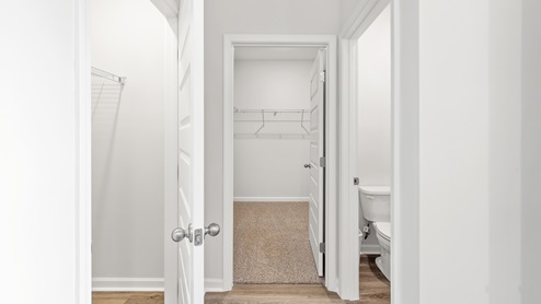 Primary bath with access to primary closet