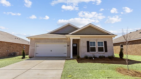 Single story home with brick and two car garage