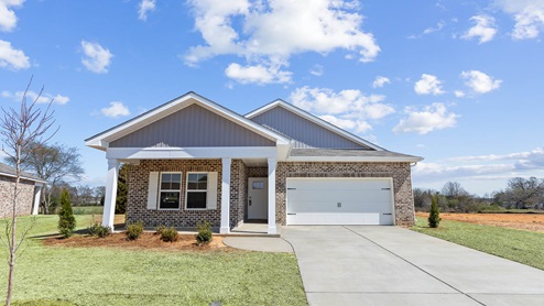 Single story home with brick and two car garage