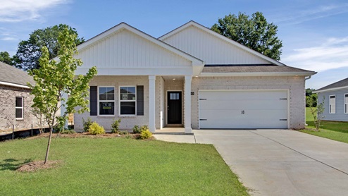 Single story home iwith brick and two car garage