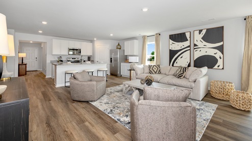 Dining room area with LVP flooring and windows