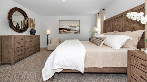 Primary bedroom with carpet