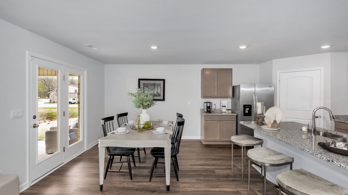 Kitchen island with view of dining / living room area