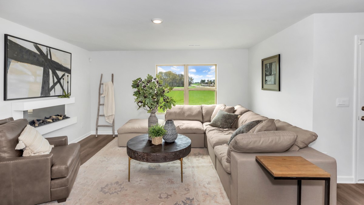 Dining room area with LVP flooring and windows