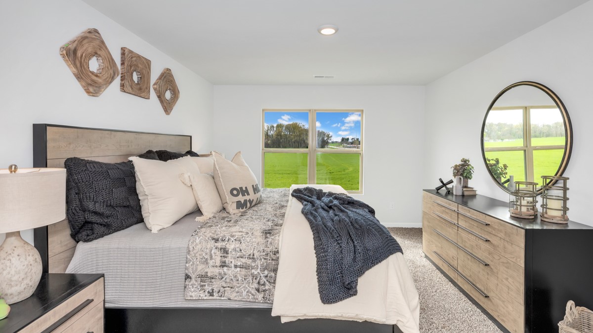 Primary bedroom with carpet