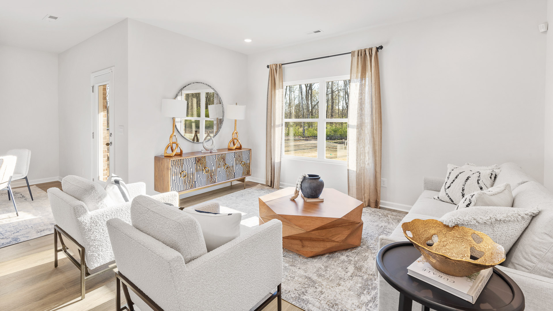 Dining room area with LVP flooring and windows