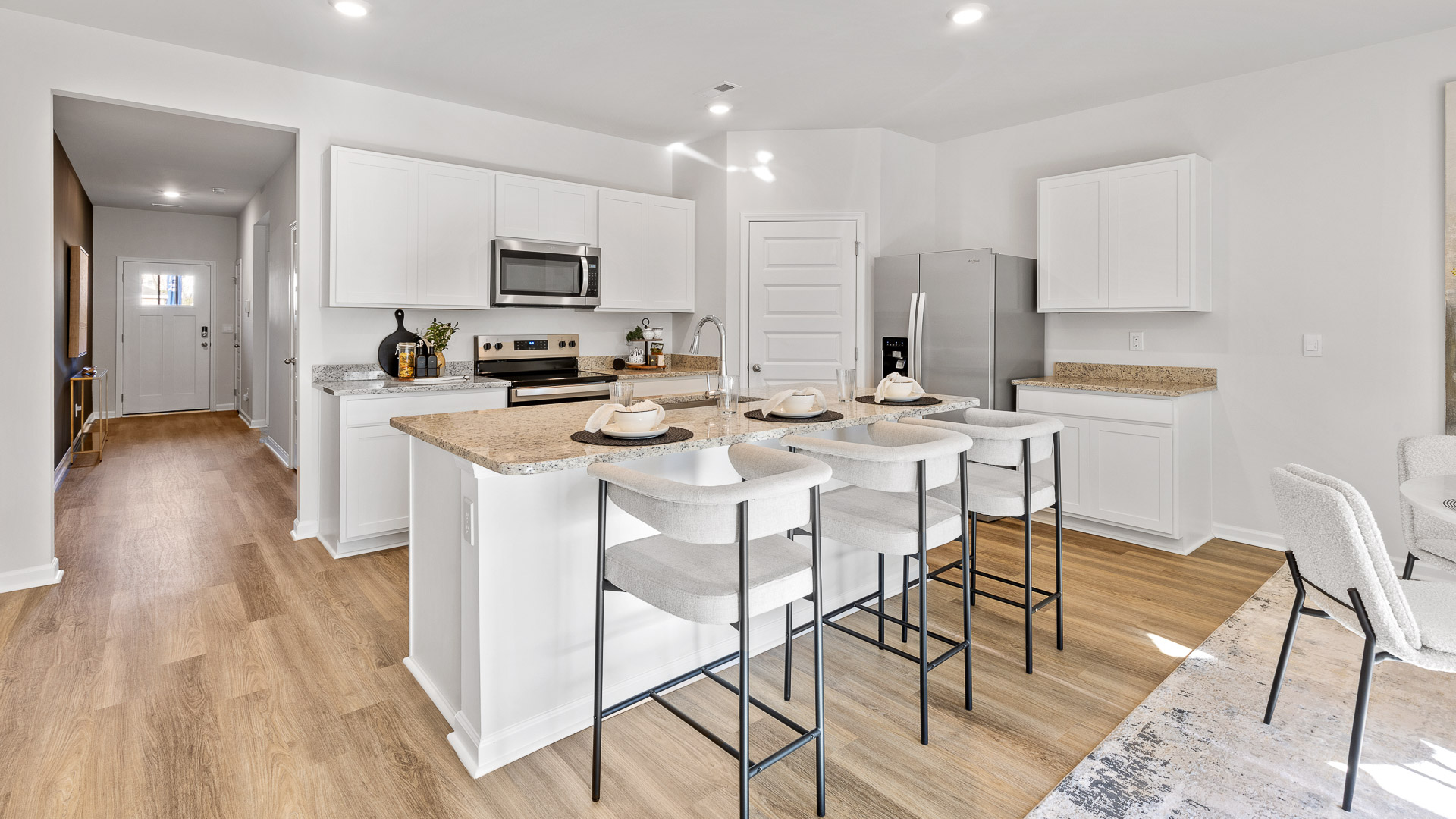 kitchen island with view of the foyer