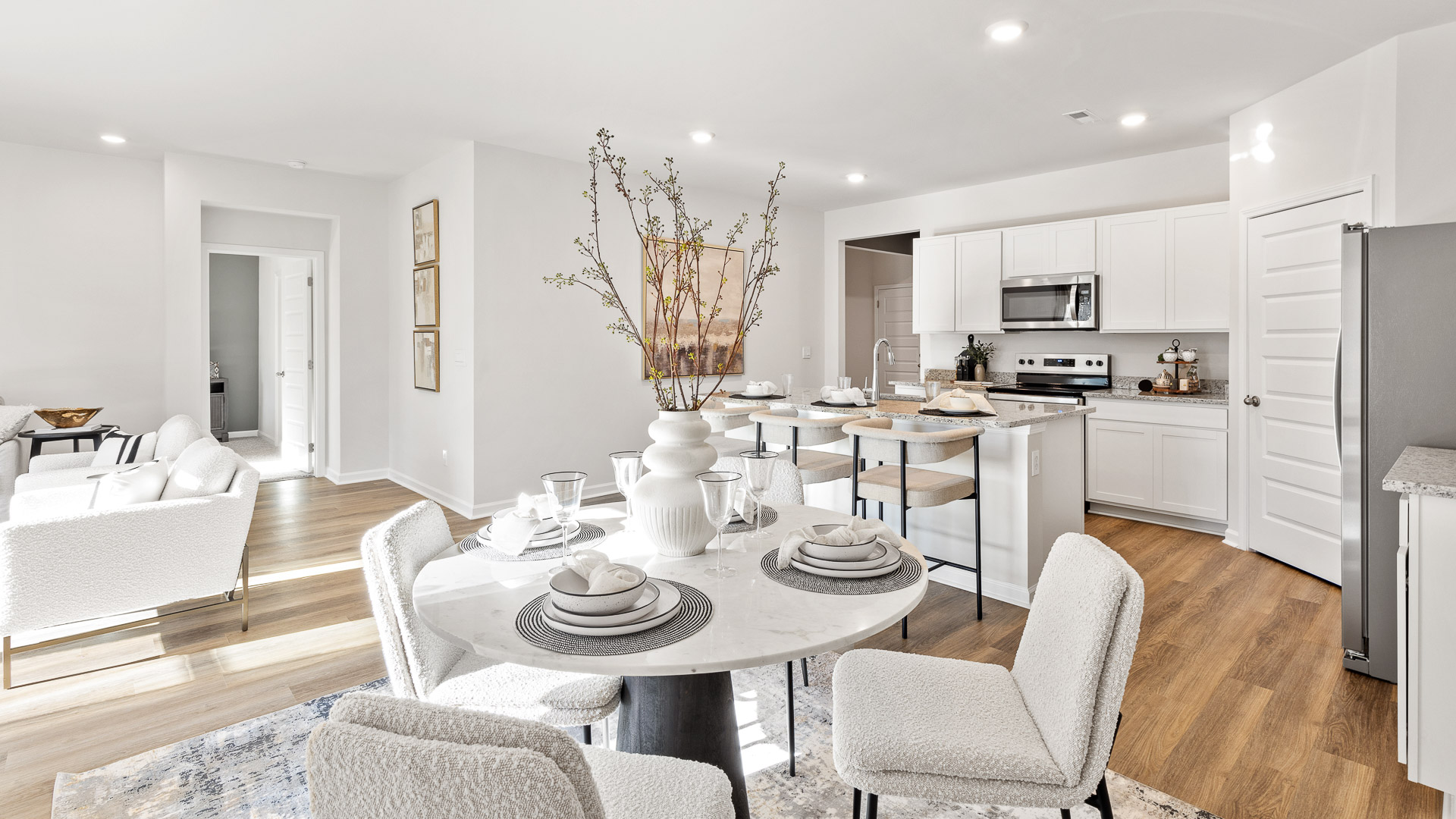 Dining room area with LVP flooring and windows