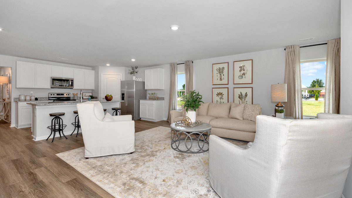 Kitchen island with view of dining / living room area