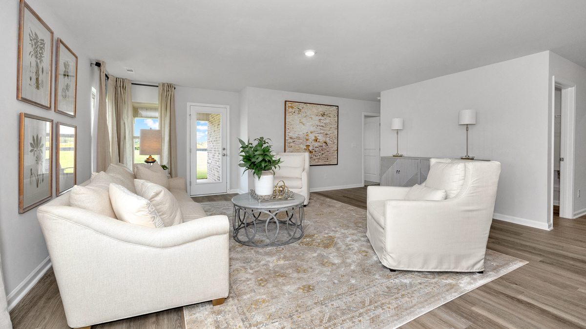 Dining room area with LVP flooring and windows