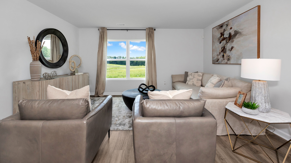 Dining room area with LVP flooring and windows