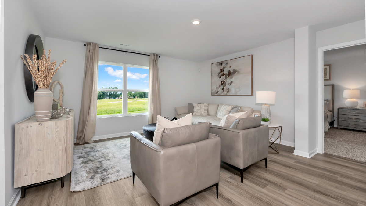 Dining room area with LVP flooring and windows