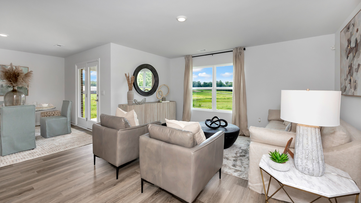 Dining room area with LVP flooring and windows