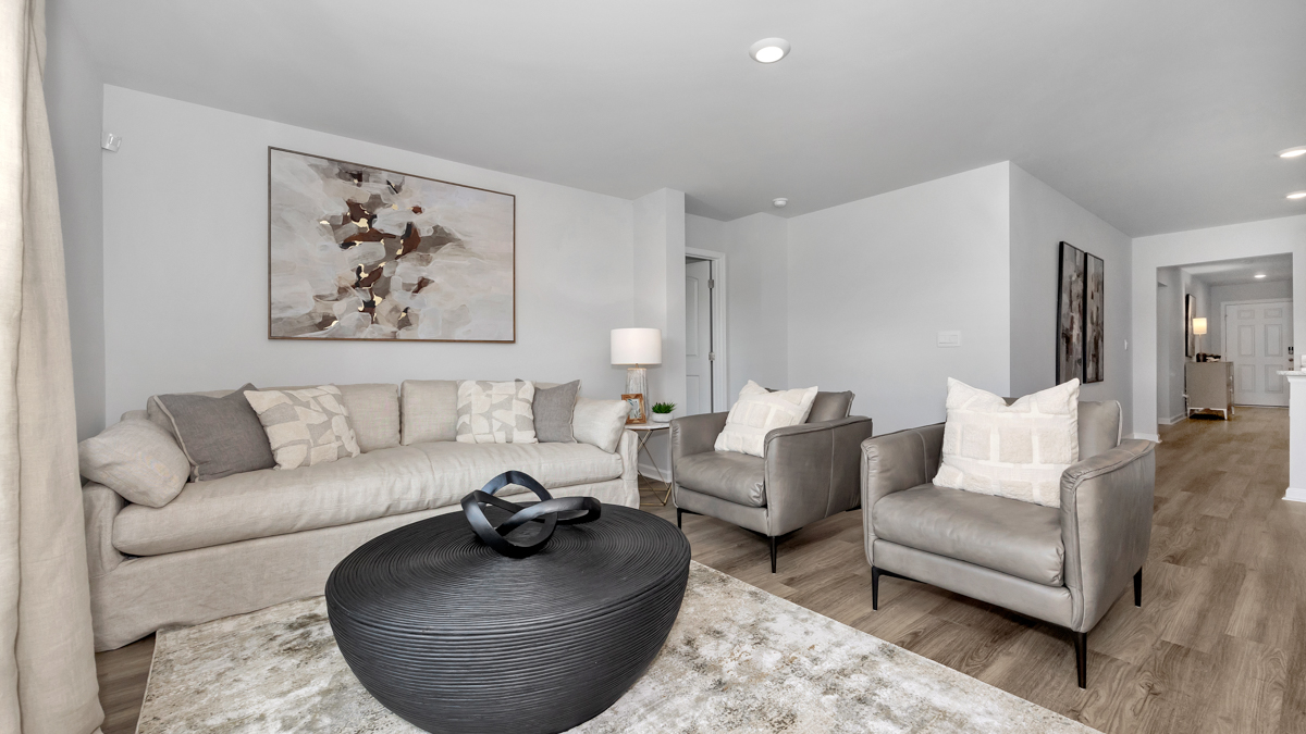 Dining room area with LVP flooring and windows