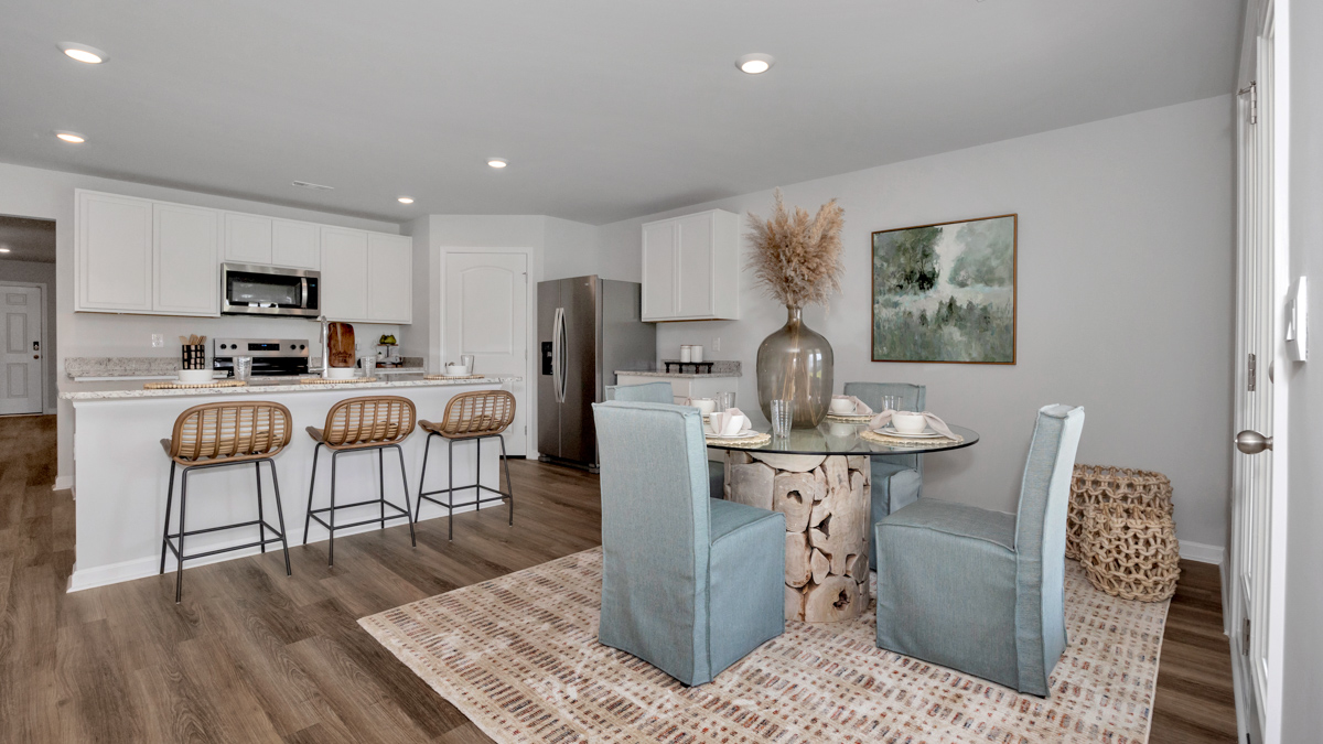 Kitchen island with view of dining / living room area