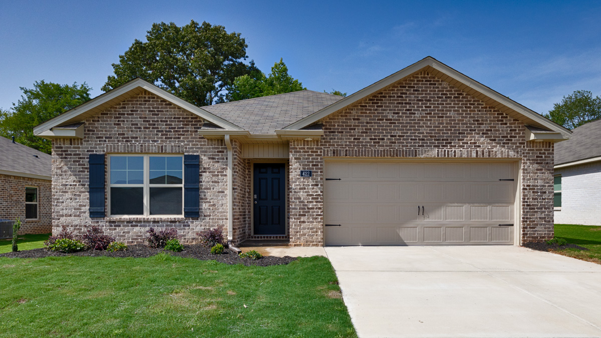 Single story home with brick and two car garage