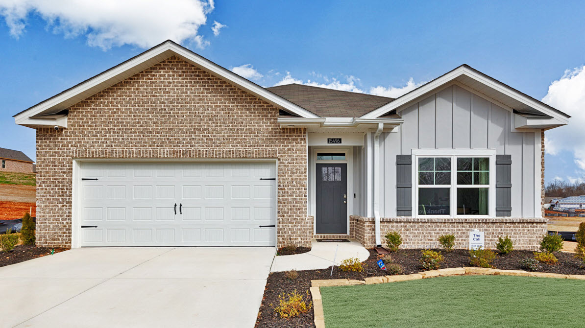 Single story home with hardi and brick and two car garage