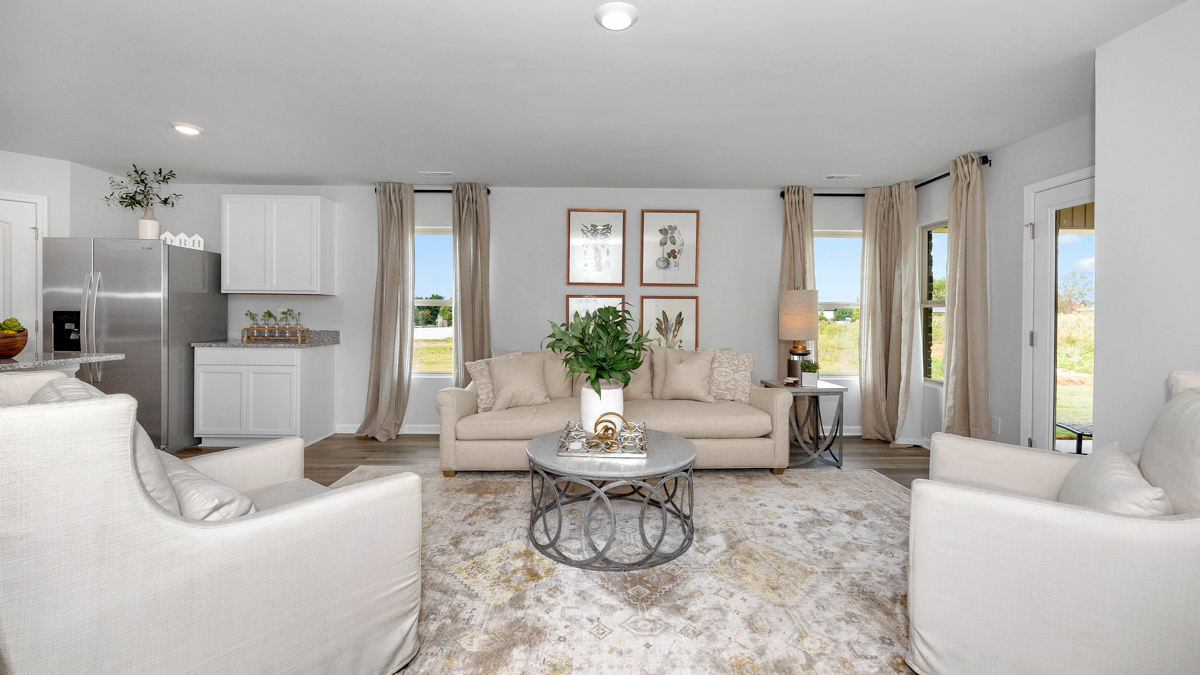 Dining room area with LVP flooring and windows