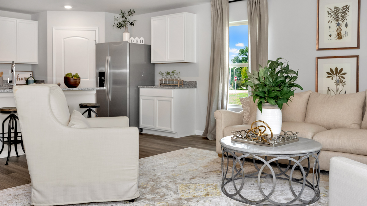 Dining room area with LVP flooring and windows