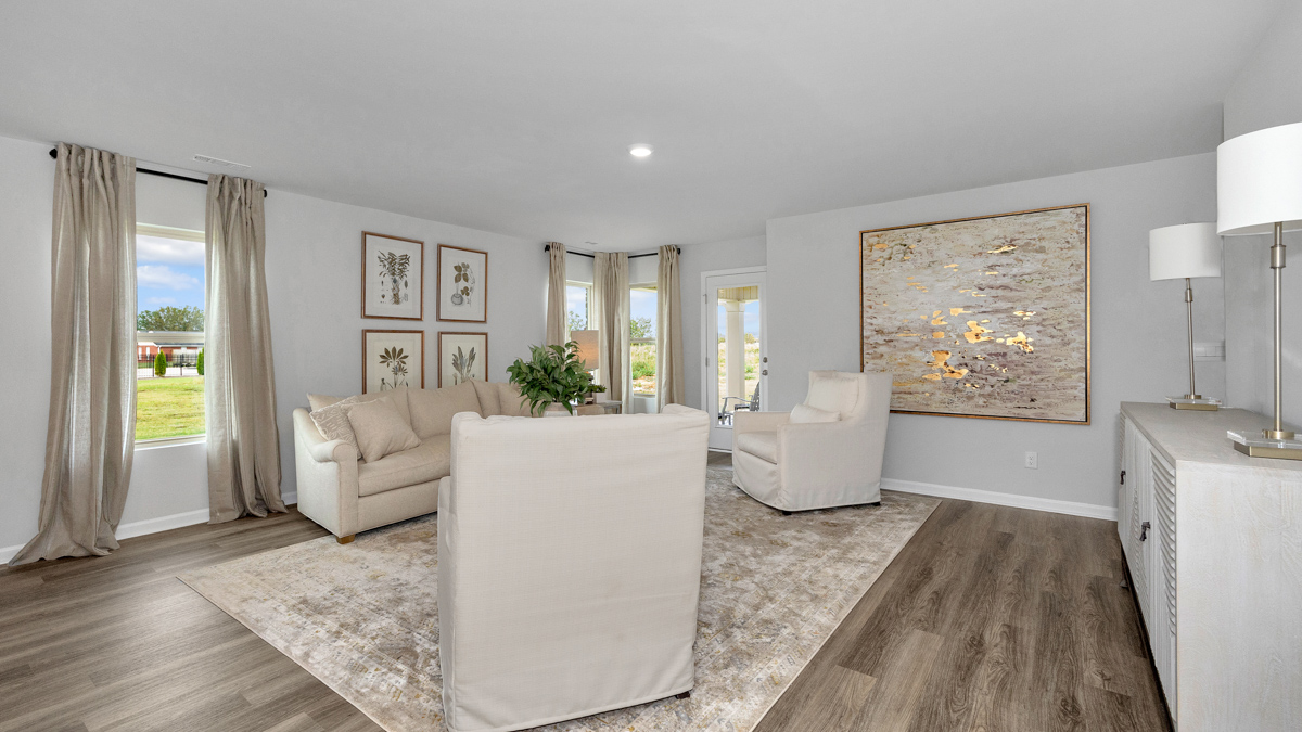 Dining room area with LVP flooring and windows