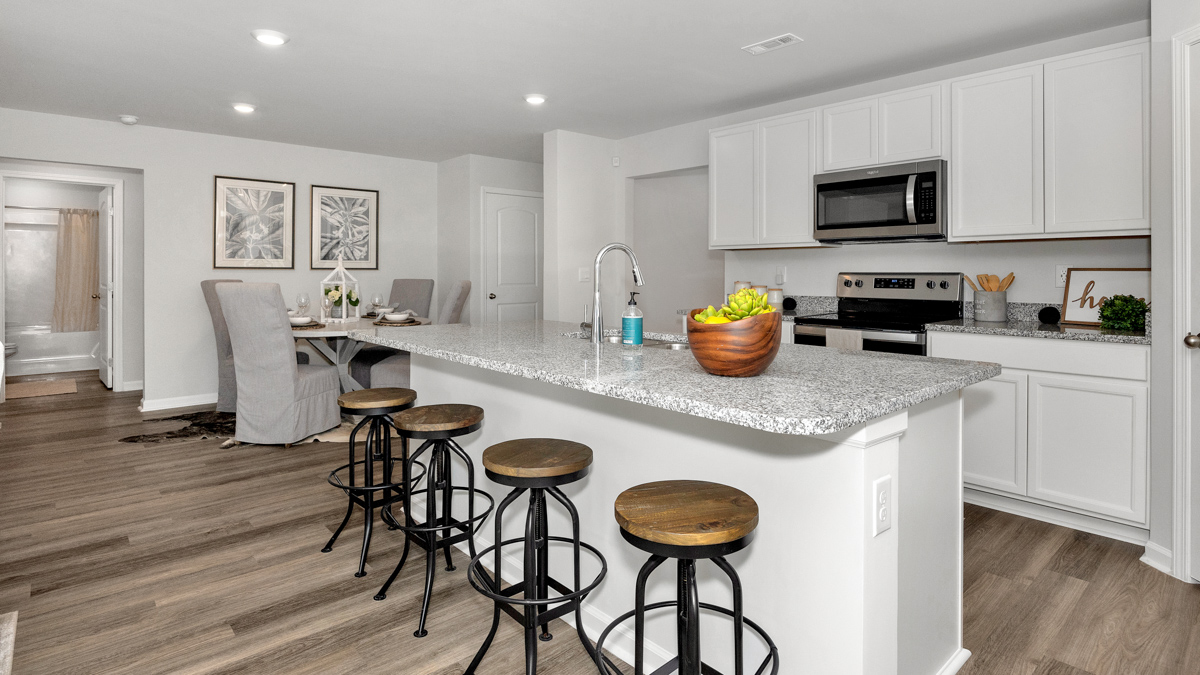 kitchen island with view of the foyer