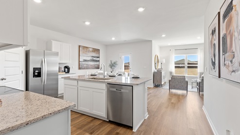 Kitchen island with view of dining / living room area
