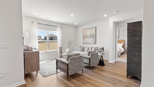 Dining room area with LVP flooring and windows