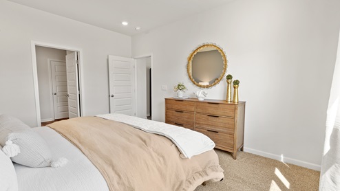 Primary bedroom with carpet