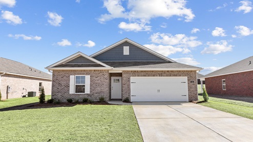 Single story home with brick and two car garage