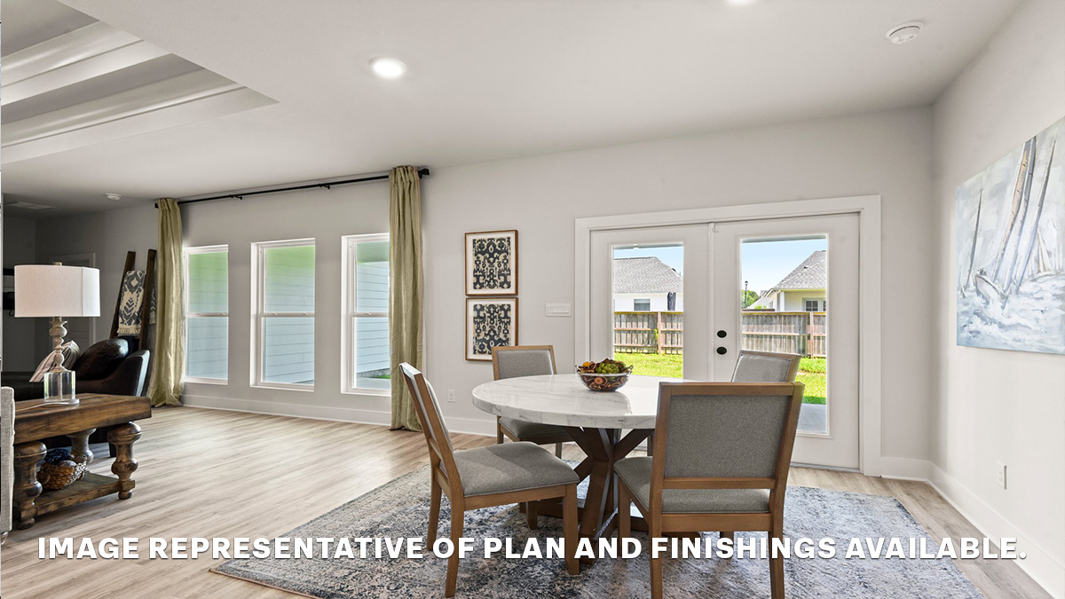 Eat in kitchen area with opening to patio