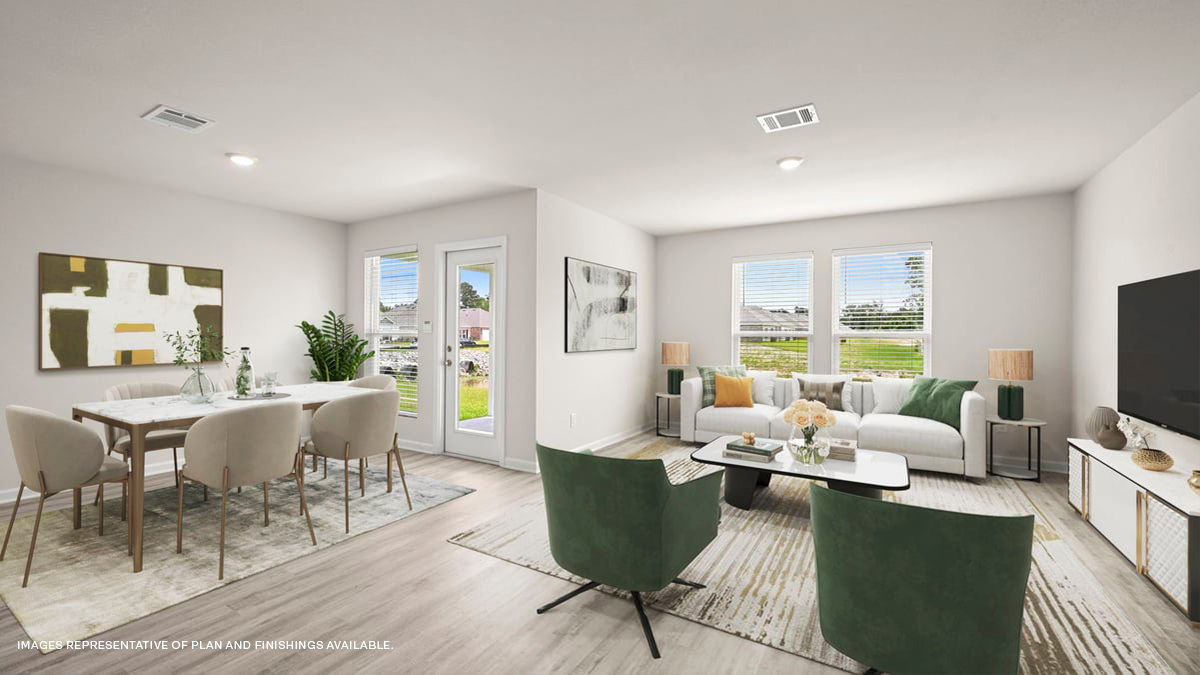 spacious living room with dual windows overlooking backyard