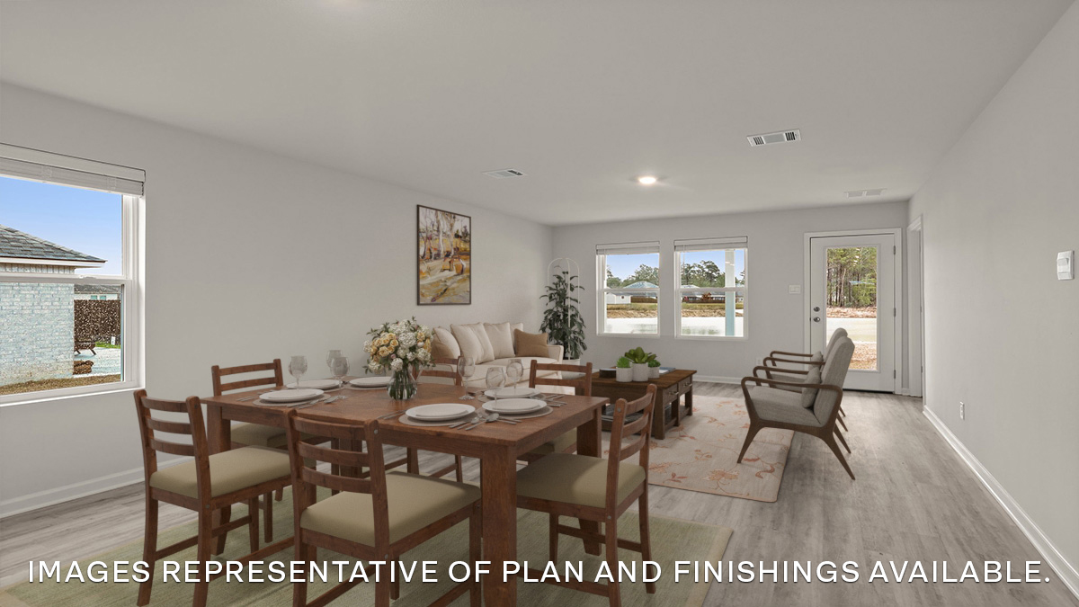 dining room near kitchen with side window and living room in the rear