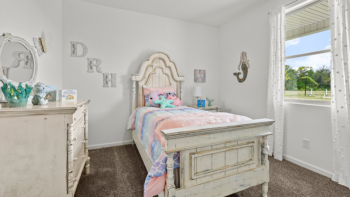 third bedroom with single window and room for a queen bed