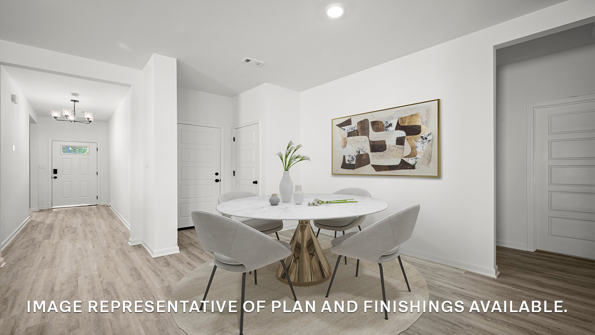 open-concept dining room with access to other bedrooms