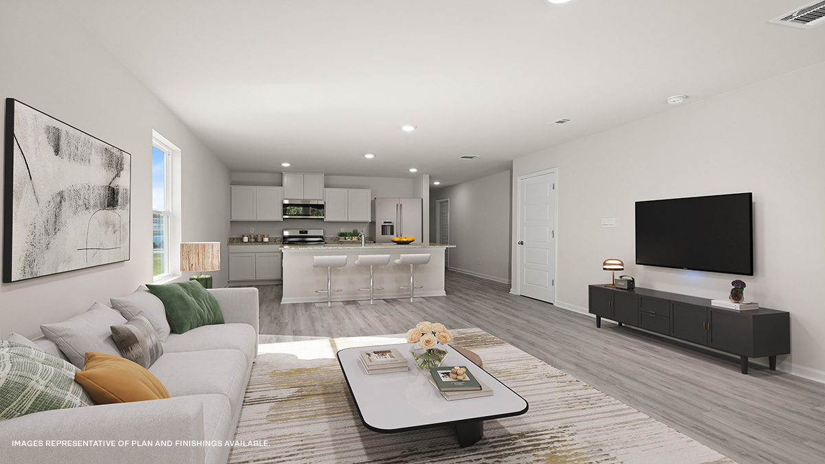 open concept living space with kitchen in the rear with gray kitchen island