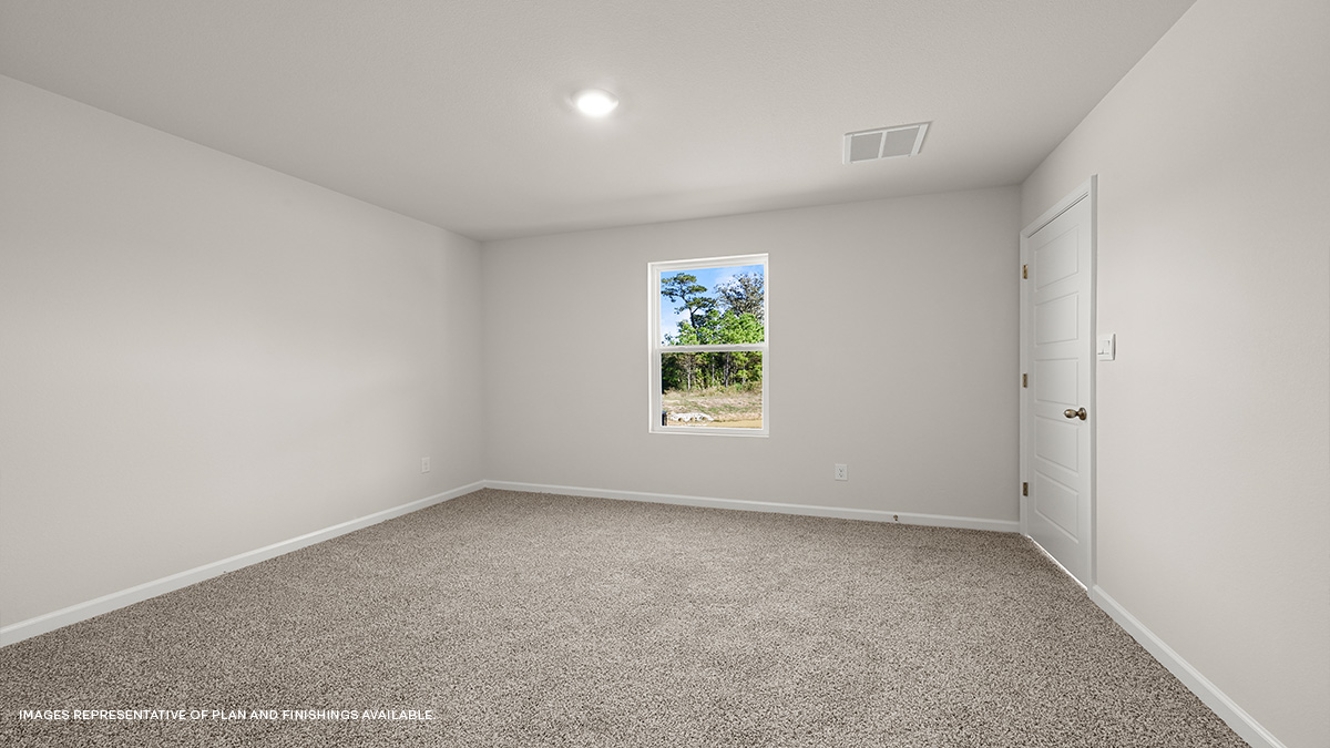 primary bedroom with single window and space for a king size bed set