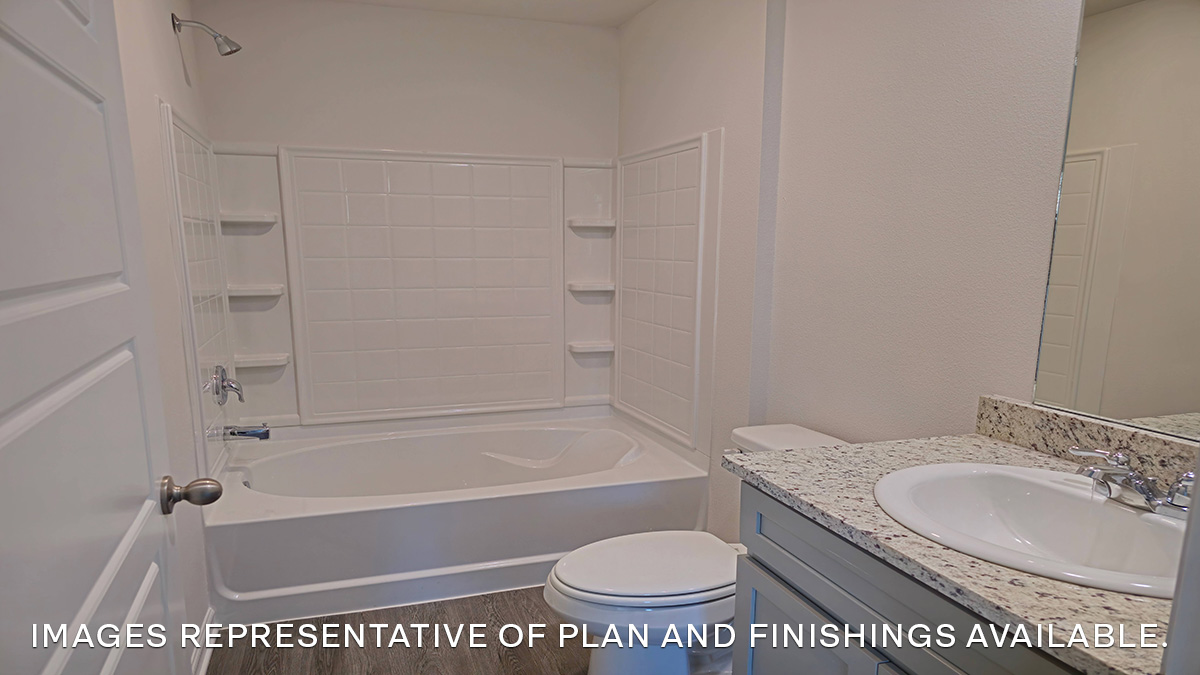 primary bath with shower tub combo and single vanity
