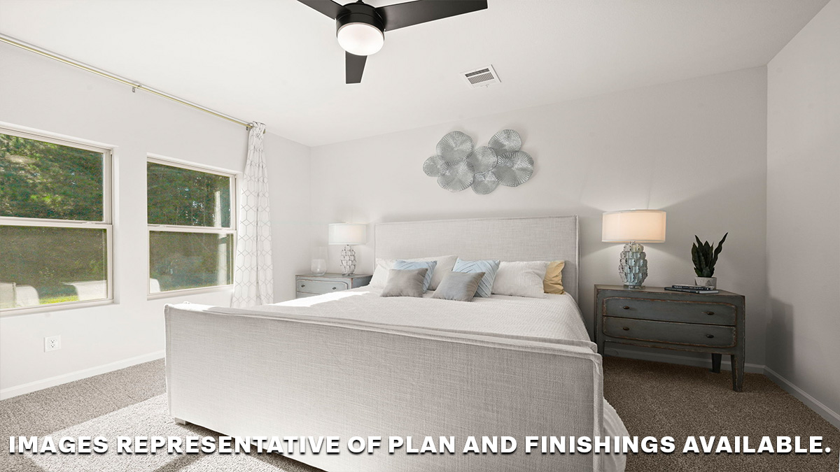 primary bedroom with room for a king-sized bed and rear facing window