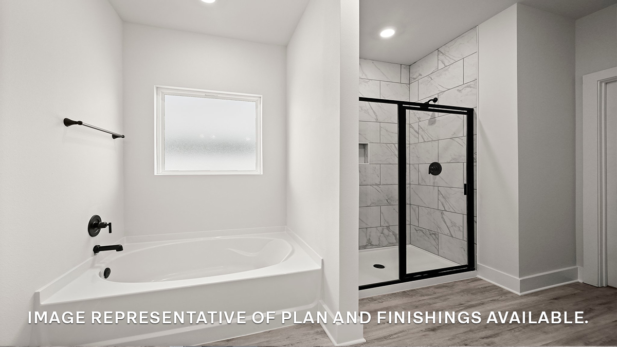 Separate shower and tub in primary bathroom