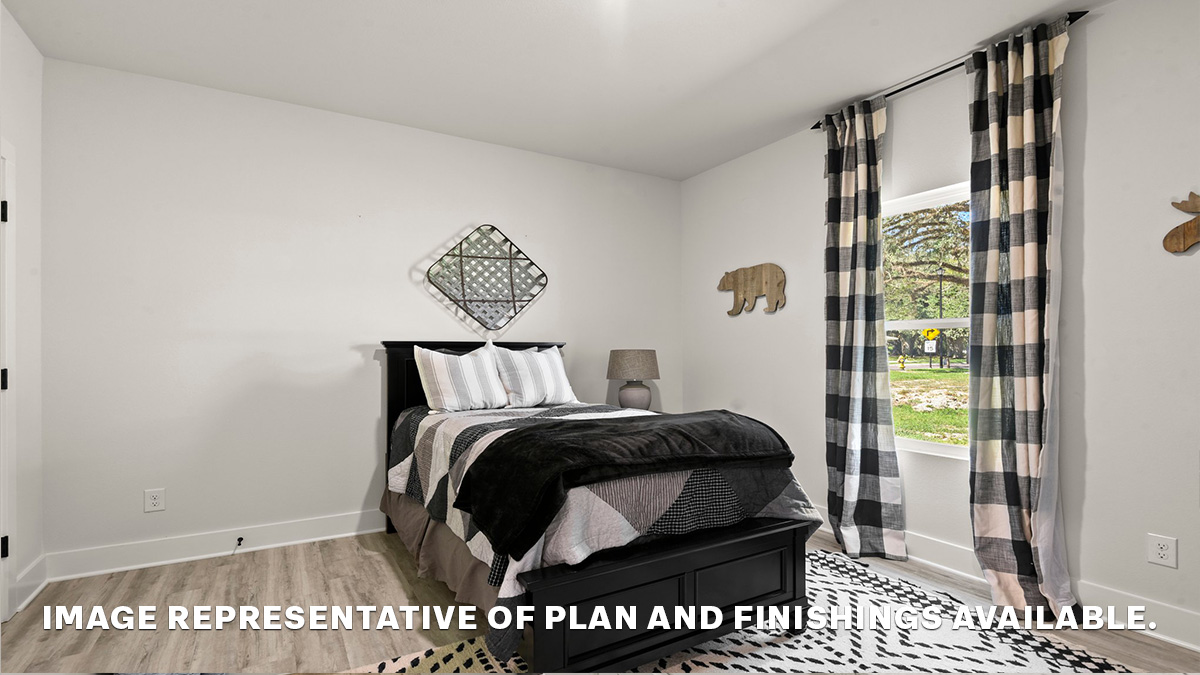 Fourth guest bedroom with single window and space for full or queen bedroom set