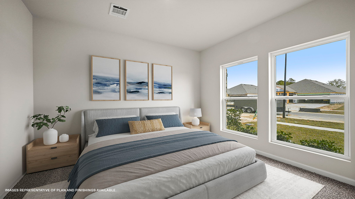 Second bedroom with dual windows and room for a queen bed