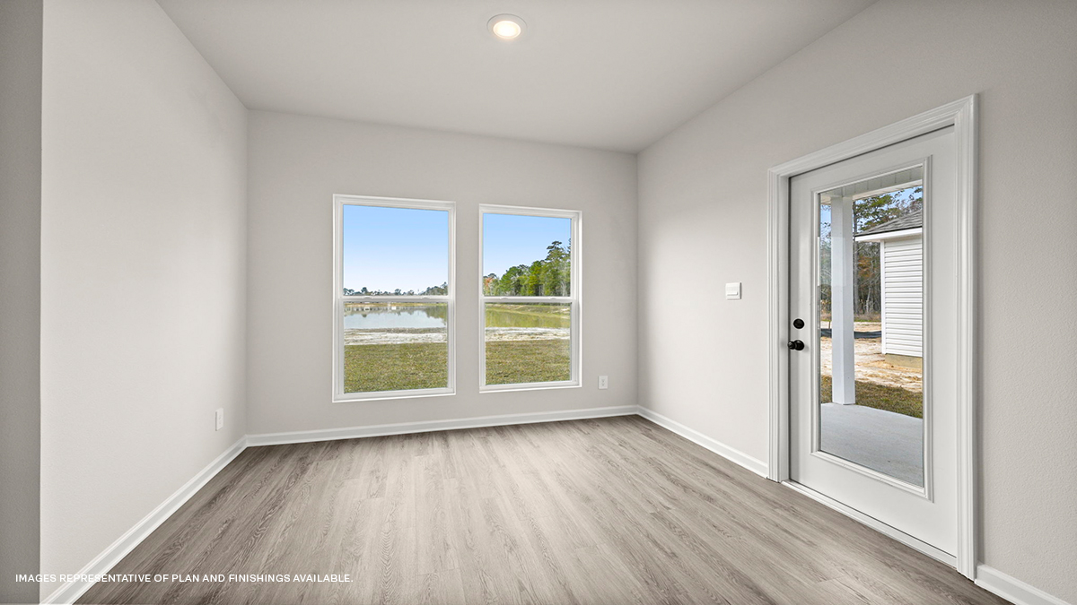 Dining room with dual windows and patio