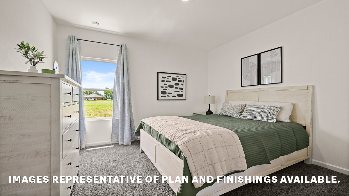 third bedroom with single window and room for a queen bed